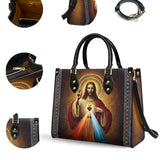 Catholight  A Testament of Grace and Compassion Leather Bag