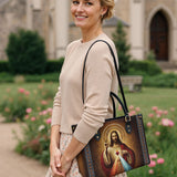 Catholight  A Testament of Grace and Compassion Leather Bag